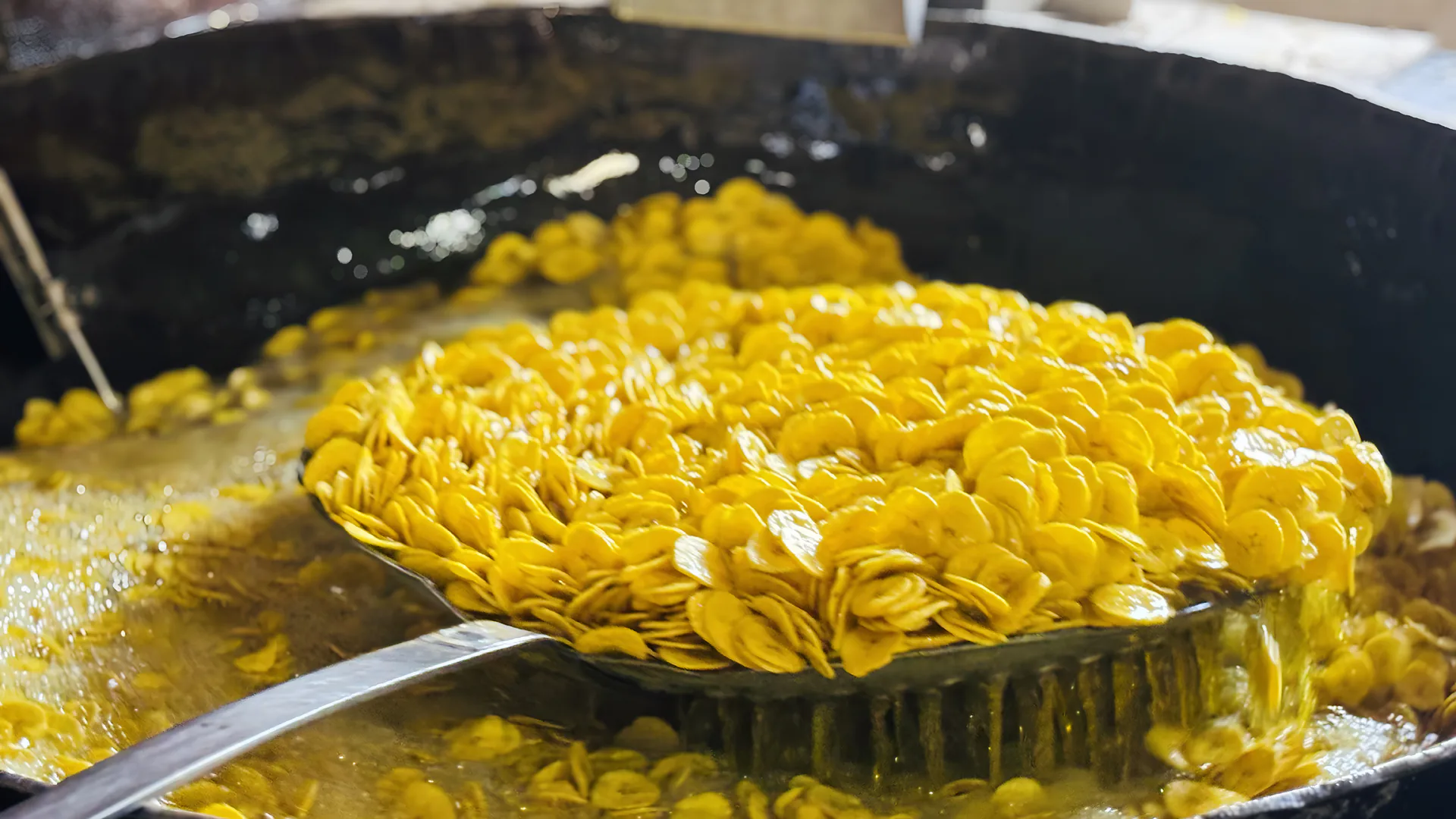 Banana chips being fried